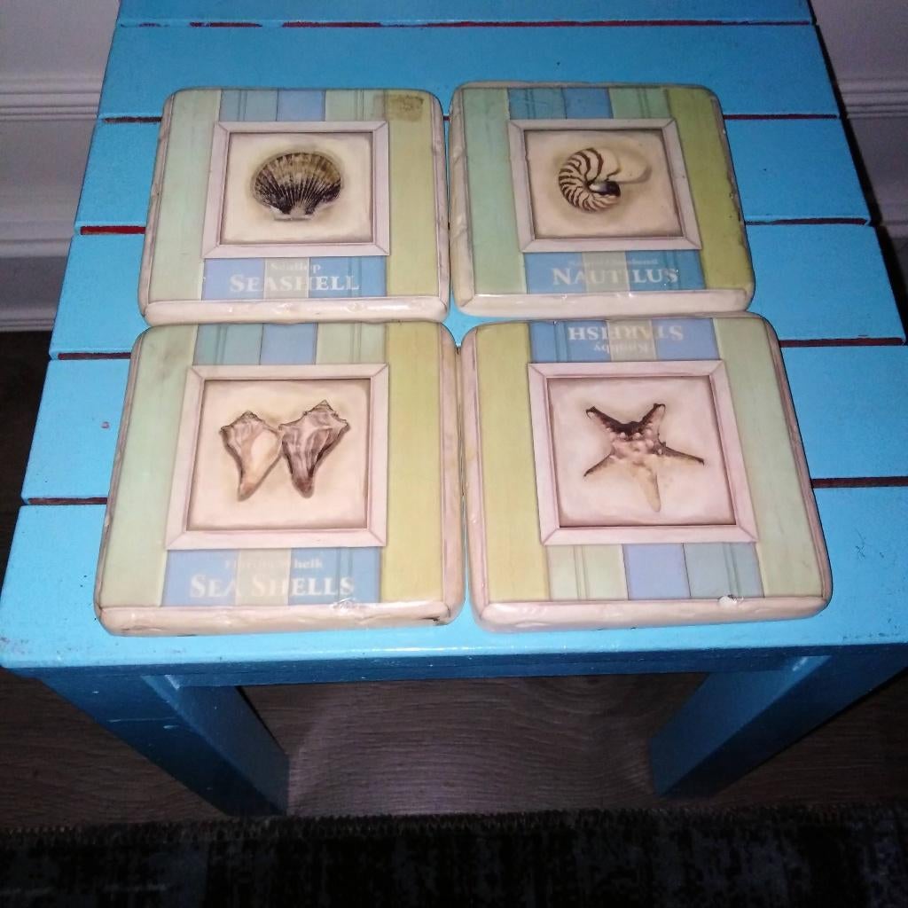 Onderzetters met schelpen/zeester afbeeldingen 4 stuks, Ophalen, Gebruikt, Glas of Kopje
