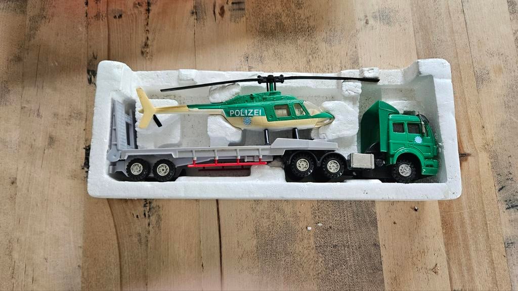 Super Transporter Mercedes met helikopter in doos., Ophalen of Verzenden, Bus of Vrachtwagen, Overige merken
