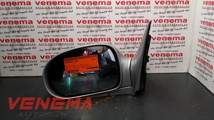 Buitenspiegel links van een Kia Carnival, -, -, Ophalen of Verzenden, -