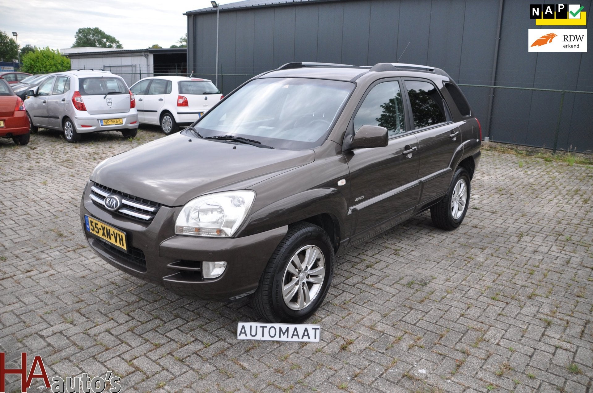 Kia Sportage 2.7 V6 X-pression 4WD Automaat *CLIMA*, Auto's, Kia, Automaat, Gebruikt, Bruin, 2656 cc
