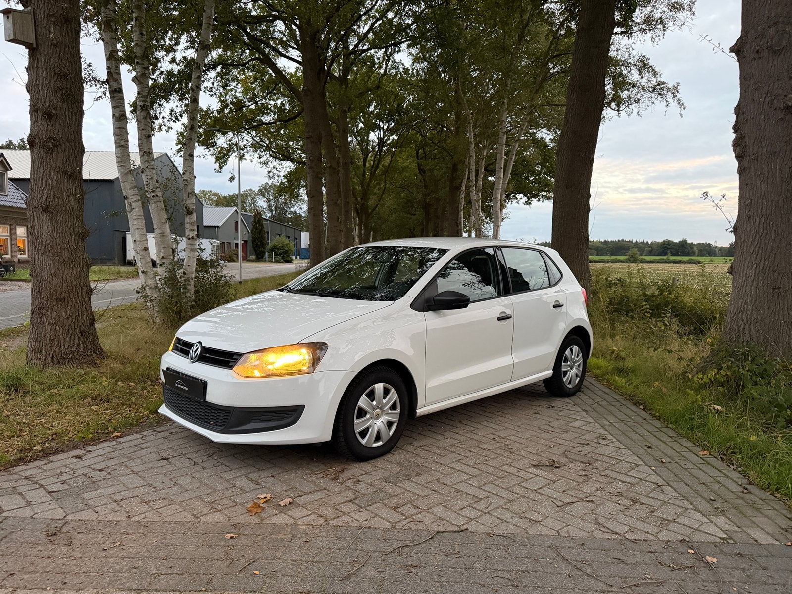 Volkswagen Polo 1.2 2011 5 DRS Stoelverwarming/Carplay, Auto's, Voorwielaandrijving, Zwart, 1199 cc, Wit