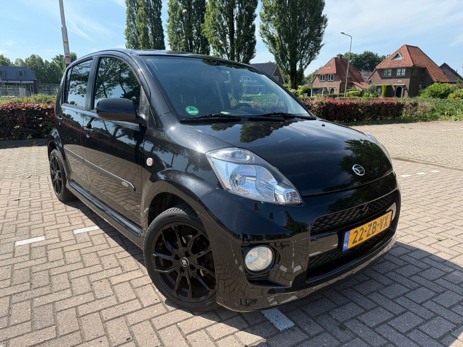 Daihatsu Sirion sport 1.3 Zwart. Vele opties, airco, Auto's, Daihatsu, Voorwielaandrijving, Stof, 4 cilinders, Zwart