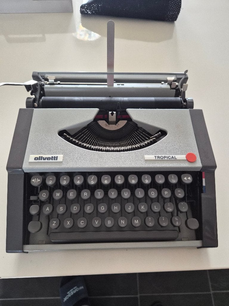 Vintage olivetti Tropical typemachine met koffer, Diversen, Ophalen, Gebruikt