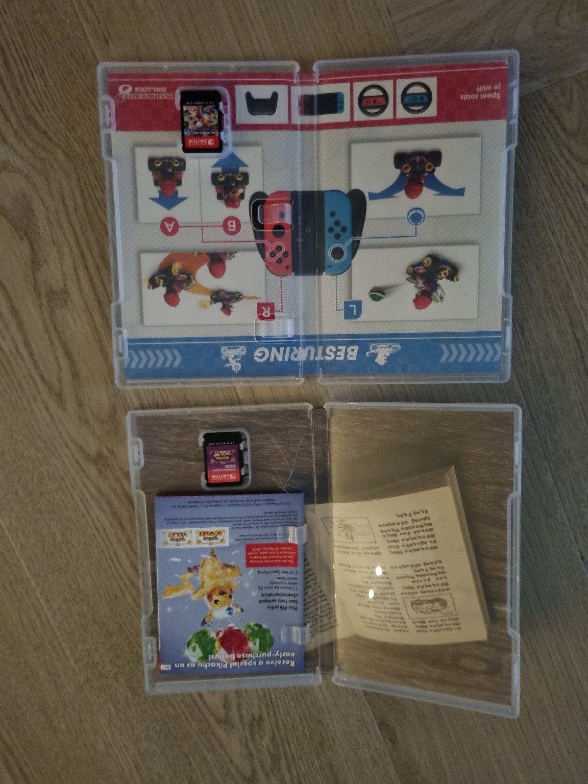Foto 6 van Nintendo Switch OLED met 2 games en accessoires