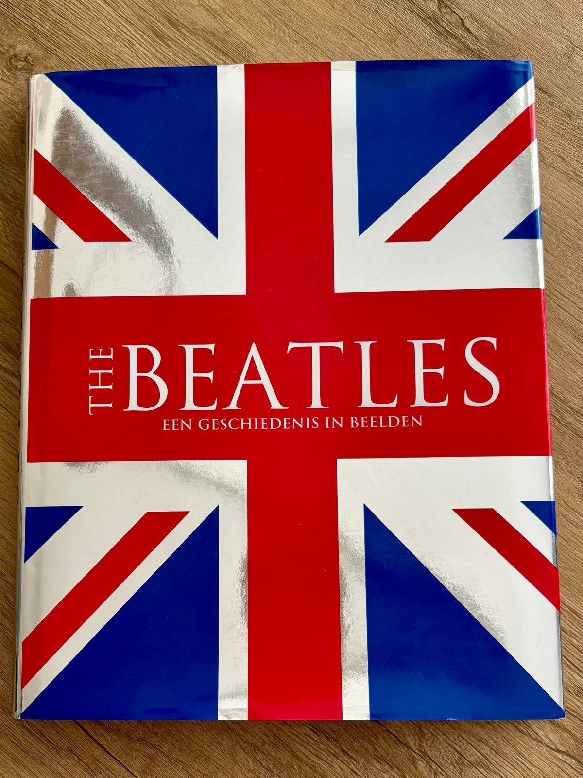 The Beatles: Een Geschiedenis in Beelden - Boek, Ophalen of Verzenden, Zo goed als nieuw, Film, Tv en Media