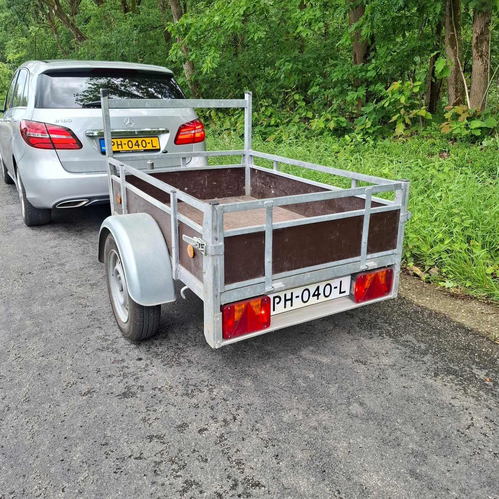 Fabrieks aanhangwagen 150x100cm 750kg met net en slot., Auto diversen, Ophalen, Zo goed als nieuw
