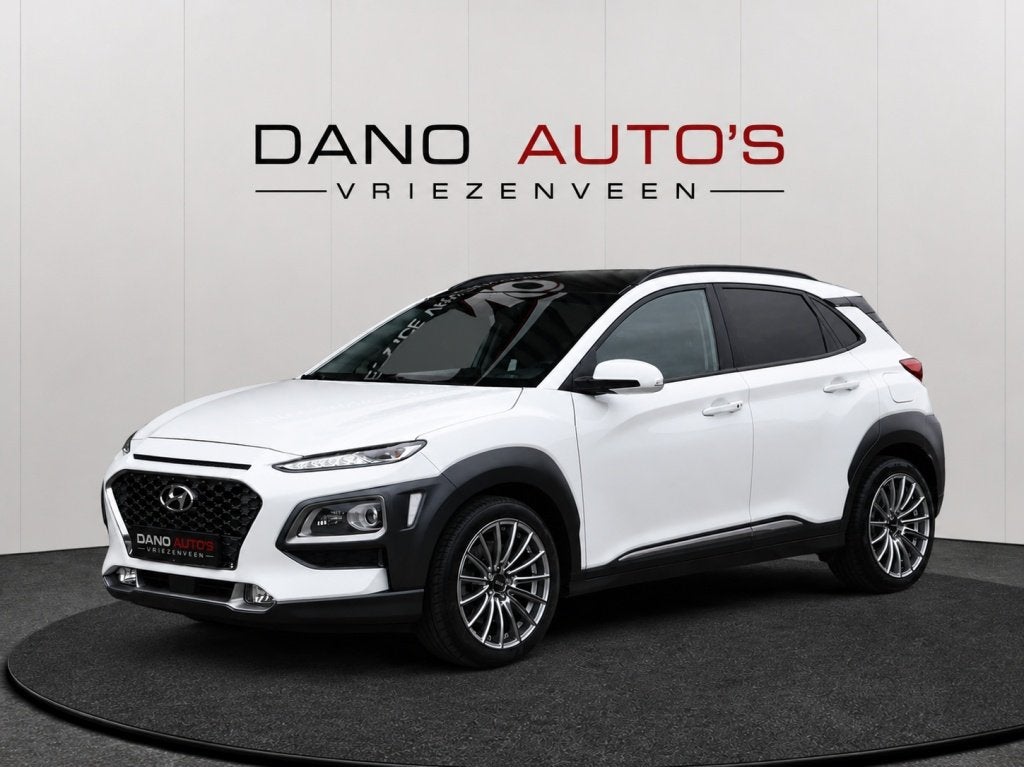 Hyundai KONA 1.6 T-GDI Premium 4WD 177PK Leer/Camera/HUD, Automaat, 4 cilinders, Automatische klimaatregeling, Wit