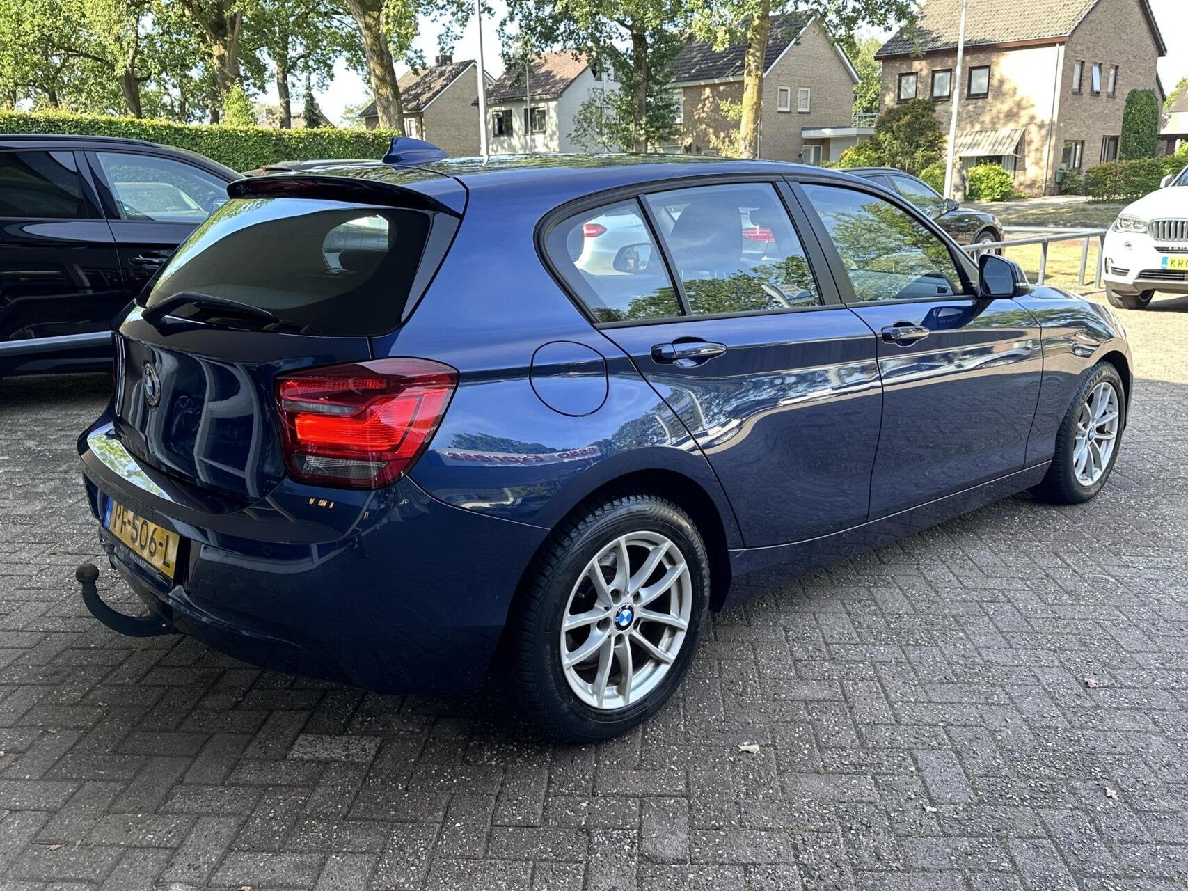 BMW 1-serie 116i Business Urban Xenon/Led, Navi, Bluetooth,, Euro 5, Gebruikt, Met garantie (alle), Blauw