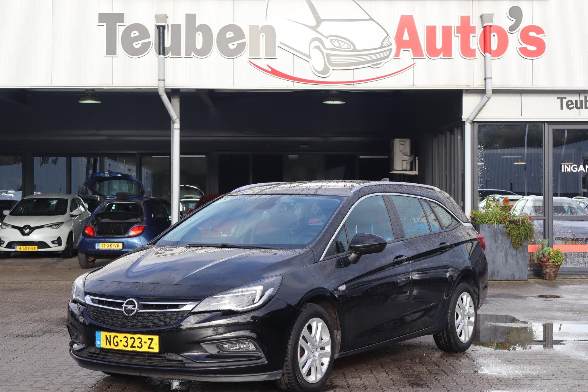 Opel Astra Sports Tourer 1.4 Business+ BTW Auto, Navigatie,, Auto's, Stof, Gebruikt, 4 cilinders, 150 pk