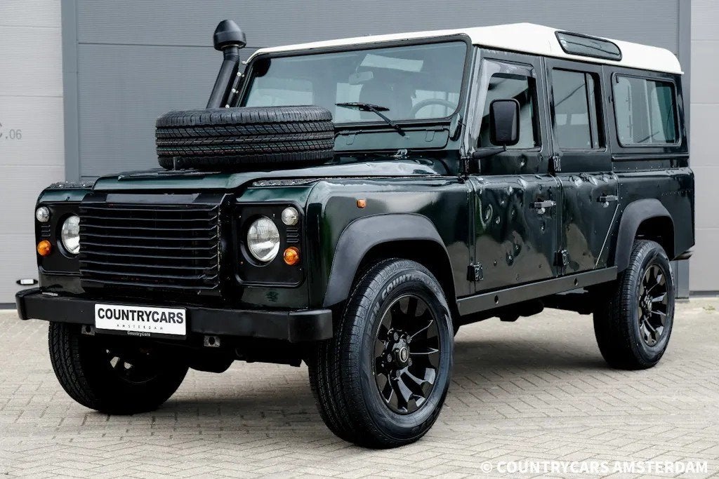Land Rover Defender 2.5 110 Country, Auto's, Stof, Gebruikt, Zwart, 4 cilinders