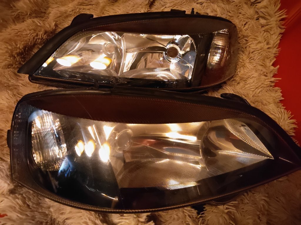 Foto 3 van koplamp Opel Astra G, links en rechts set.Prima staat