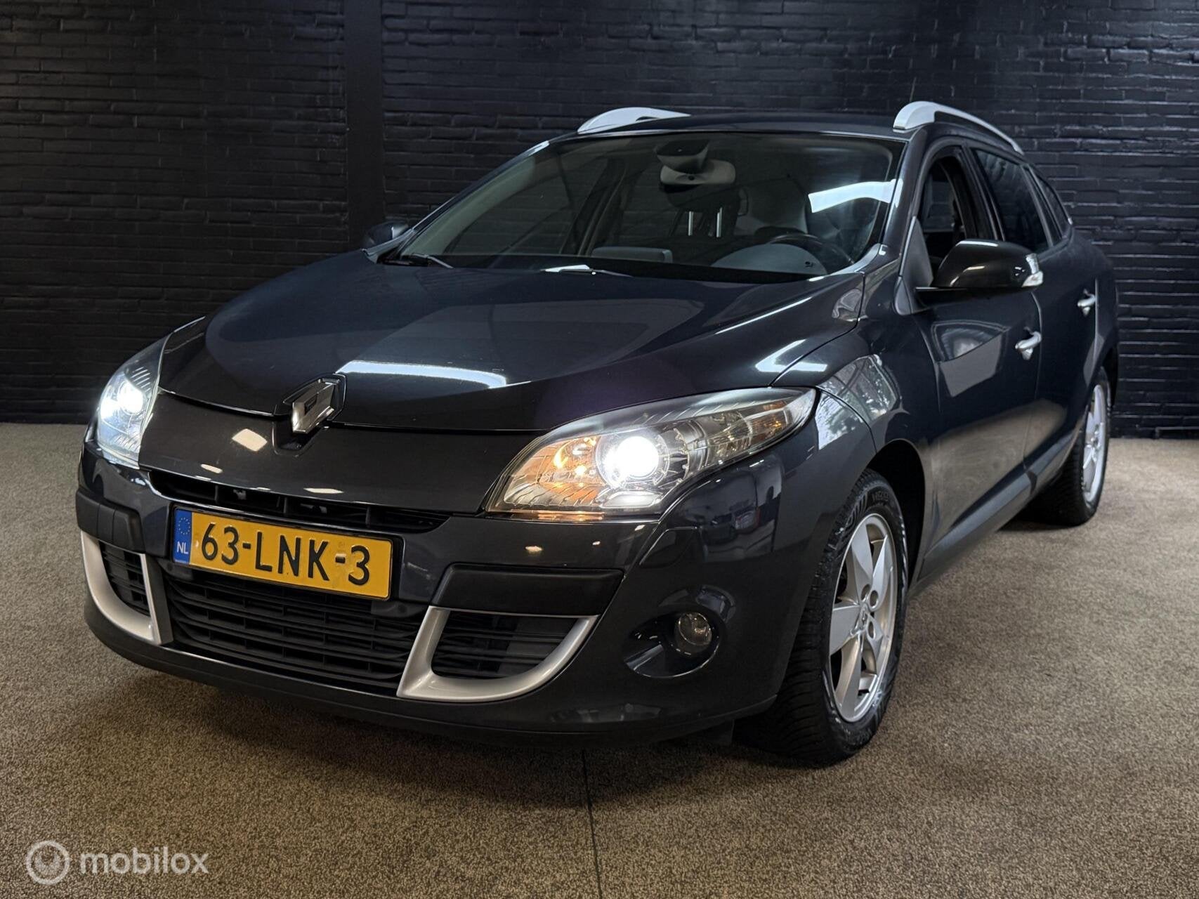 Renault Megane Estate 1.4 TCe Dynamique, Auto's, Voorwielaandrijving, Stof, Gebruikt, Zwart