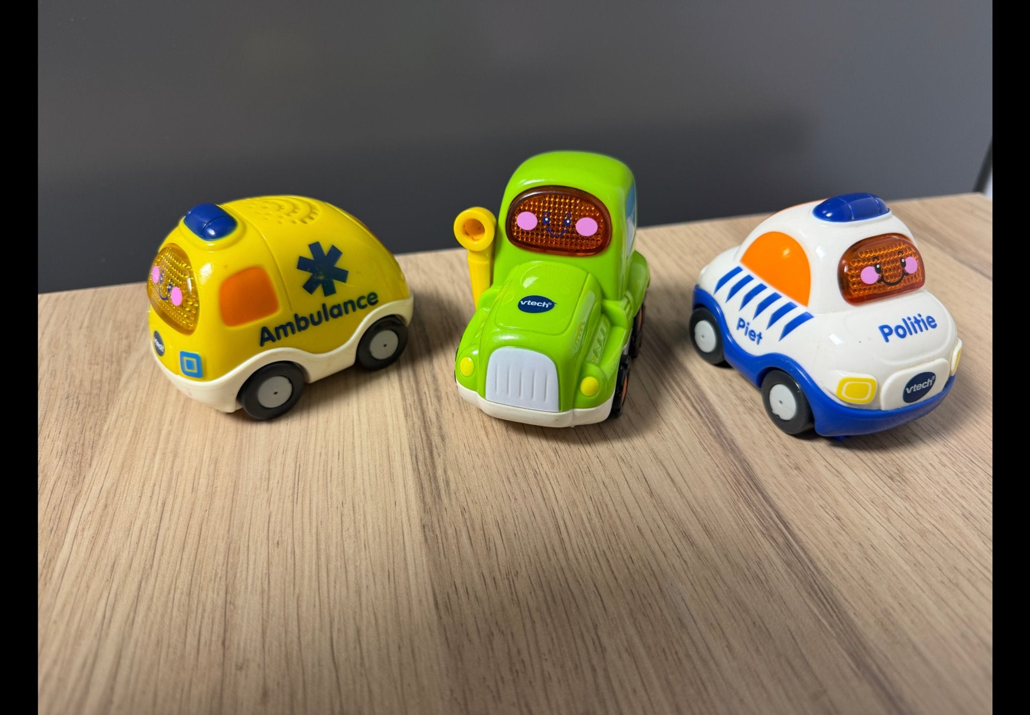 3 VTech auto's z.g.a.n. (Politie, Ambulance, Tractor), Ophalen of Verzenden, Zo goed als nieuw