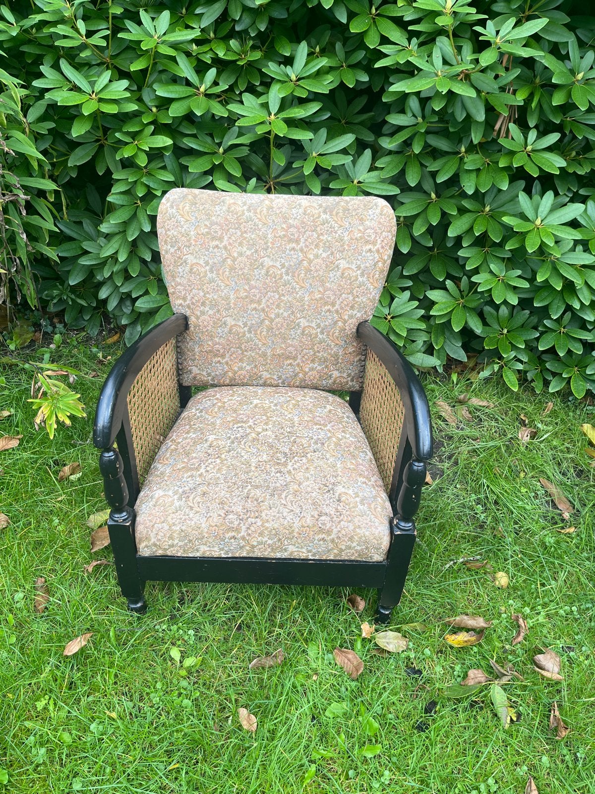 Vintage fauteuil met rotan en bloemenprint, Ophalen of Verzenden