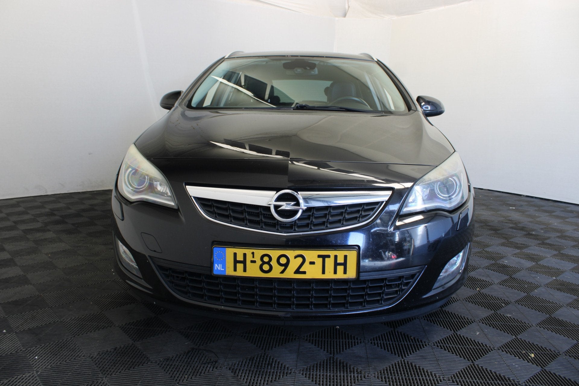 Opel Astra Sports Tourer 1.4 Turbo Edition (bj 2011), Auto's, Opel, Voorwielaandrijving, Euro 5, Stof, Gebruikt