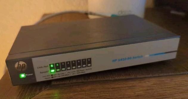 HP 1410-8G 8-poorts Gigabit Switch, Computers en Software, Netwerk switches, Ophalen of Verzenden, Gebruikt