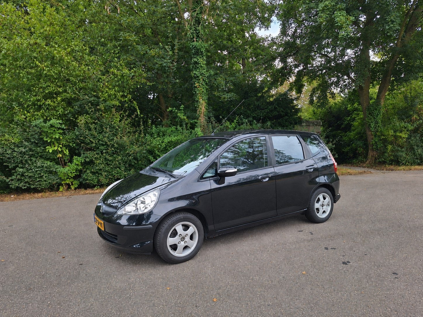 Honda Jazz 1.4 LS automaat  airco, Auto's, Honda, Automaat, 83 pk, 4 cilinders, Zwart