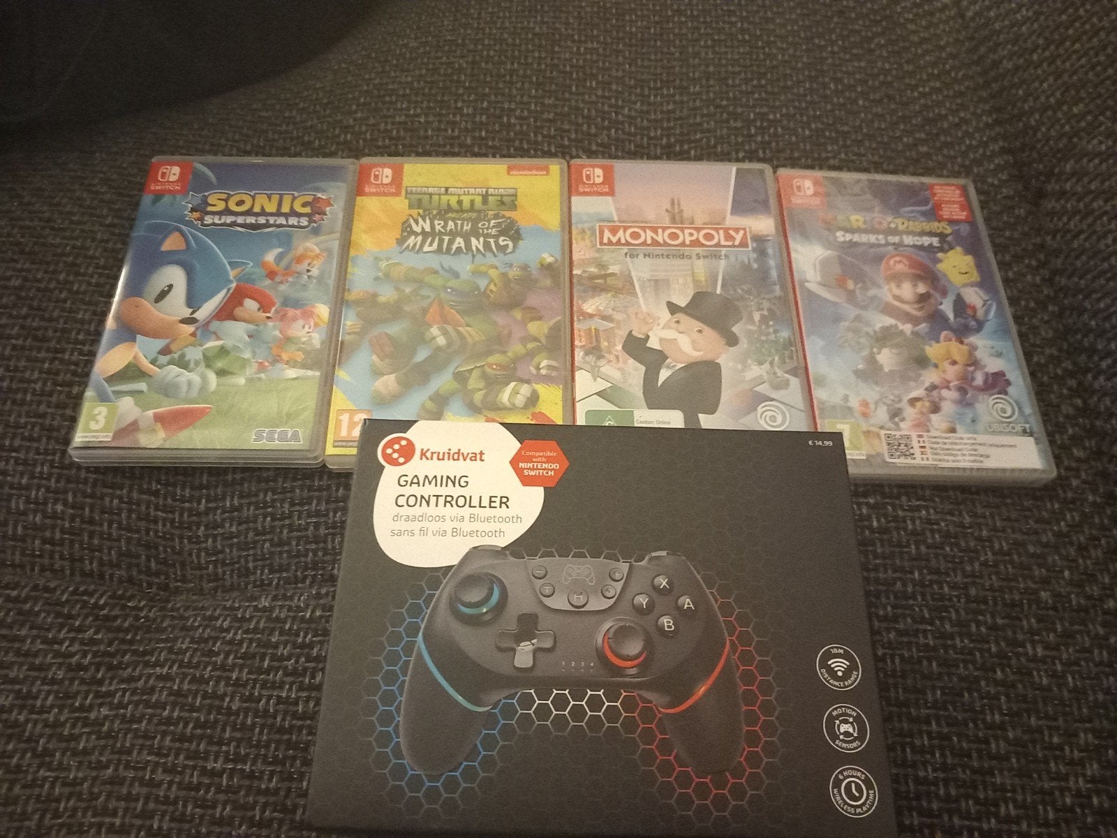 Nintendo Switch OLED met games en extra controller