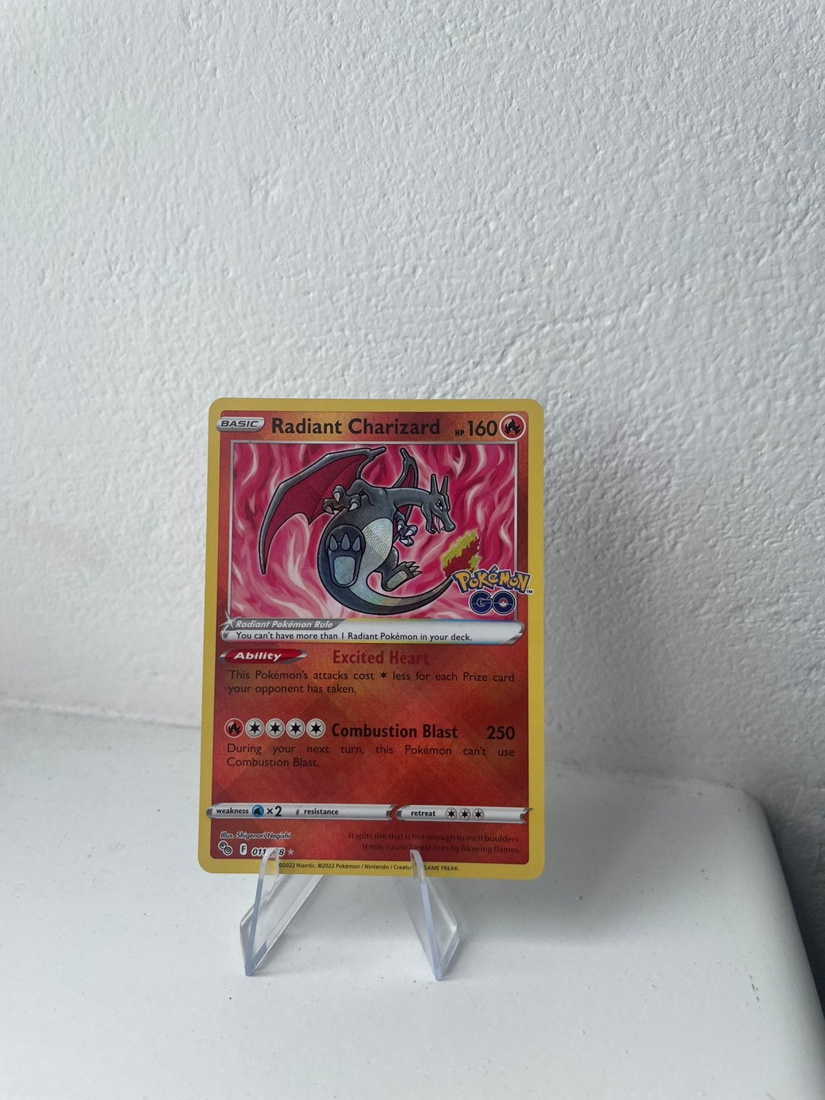 Radiant Charizard, Ophalen of Verzenden, Zo goed als nieuw, Losse kaart