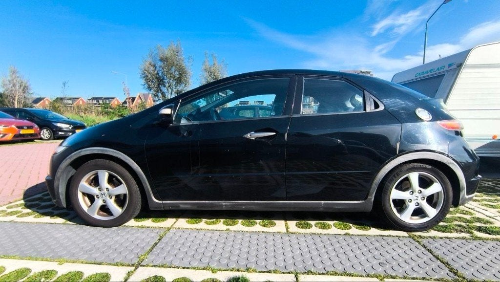 Honda Civic 1.4 I 5DR 2009 Zwart, Auto's, 83 pk, Elektrische ramen, Zwart, 4 cilinders