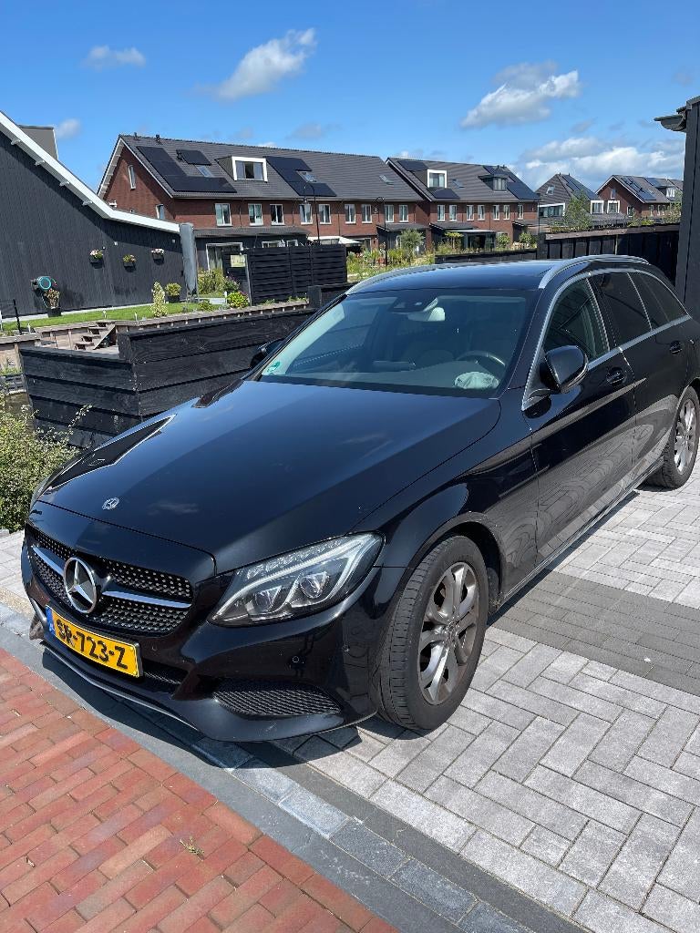 Mercedes C-Klasse C180 1.6 115KW Aut9 Estate 2017 Zwart, Auto's, Mercedes-Benz, Particulier, C-Klasse, Benzine, C, Stationwagon