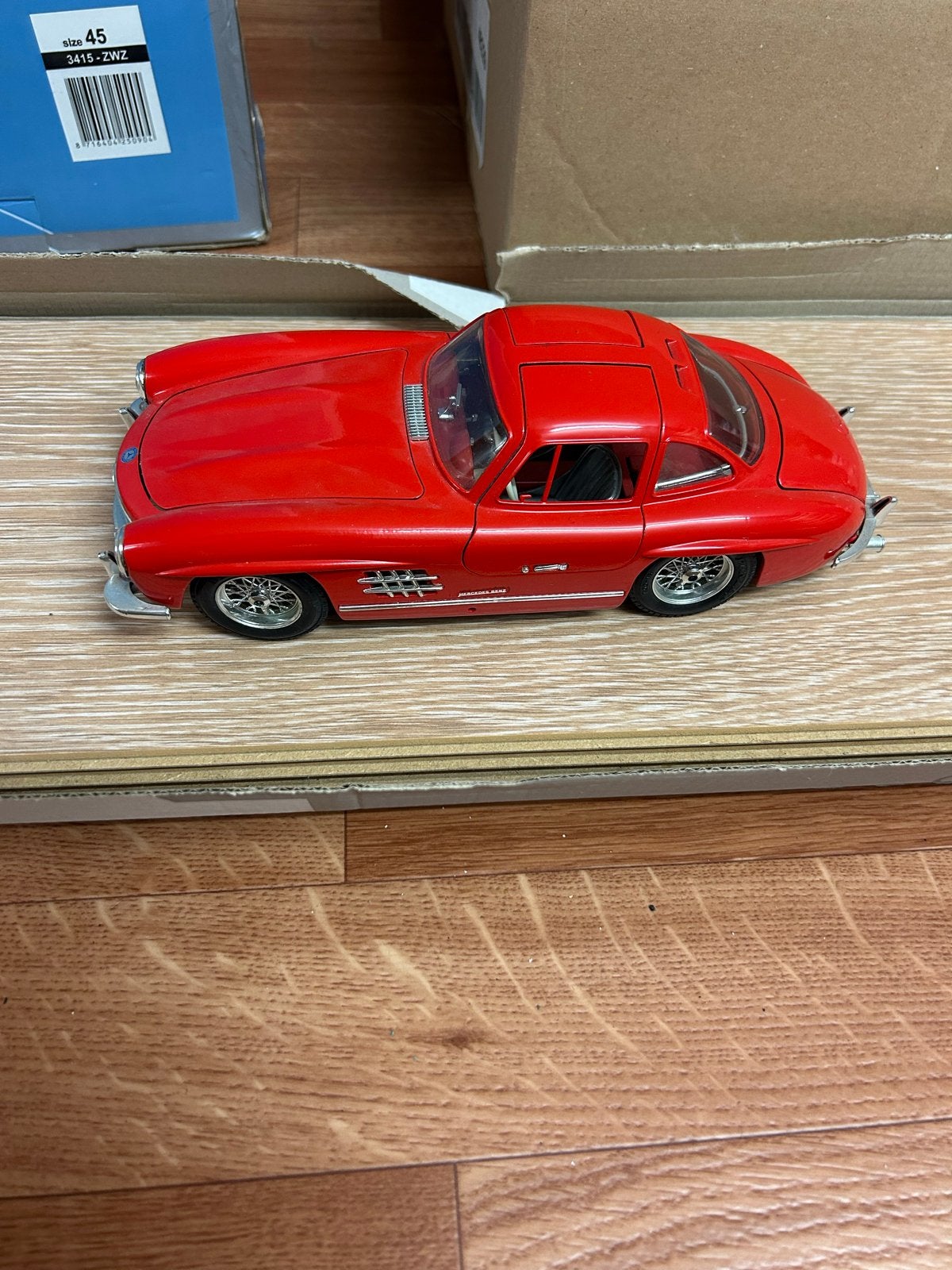 Mercedes-Benz 300 SL Gullwing schaalmodel rood, Ophalen of Verzenden, Zo goed als nieuw, Overige typen