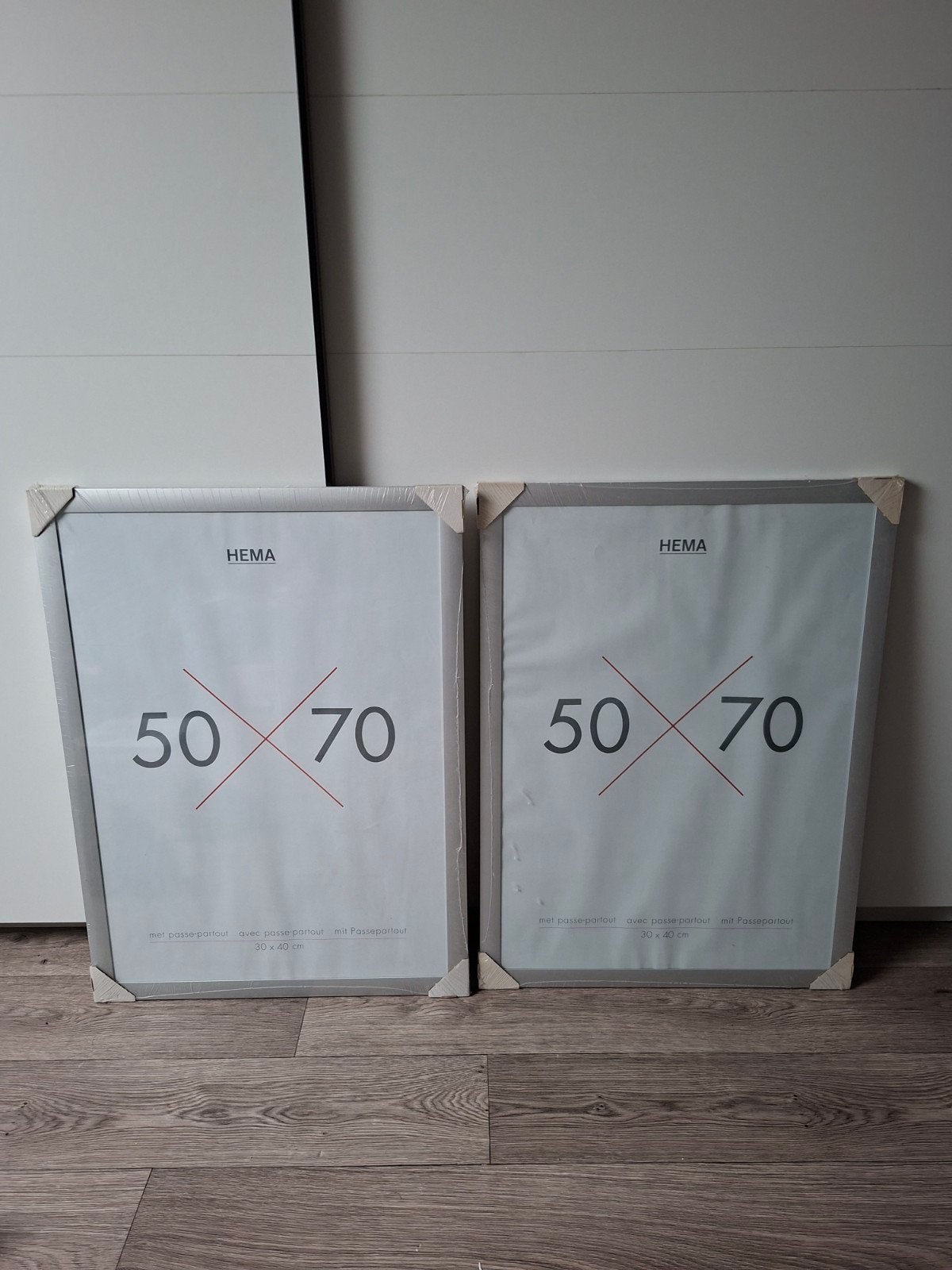 2x HEMA Fotolijst 50x70 cm - Nieuw in verpakking, Ophalen, Kunststof, Nieuw, Met glas