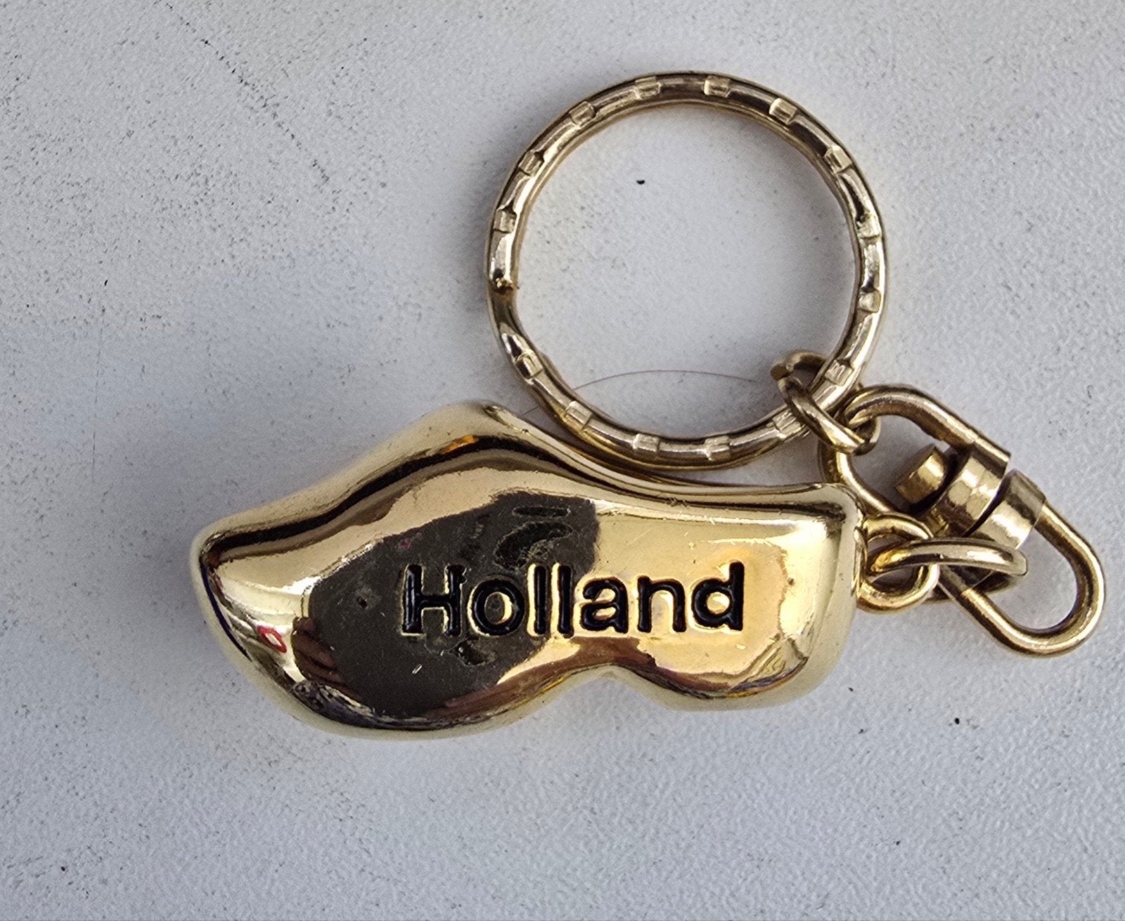 Sleutelhanger Holland Klomp Goudkleurig, Ophalen of Verzenden, Gebruikt, Stad of Land