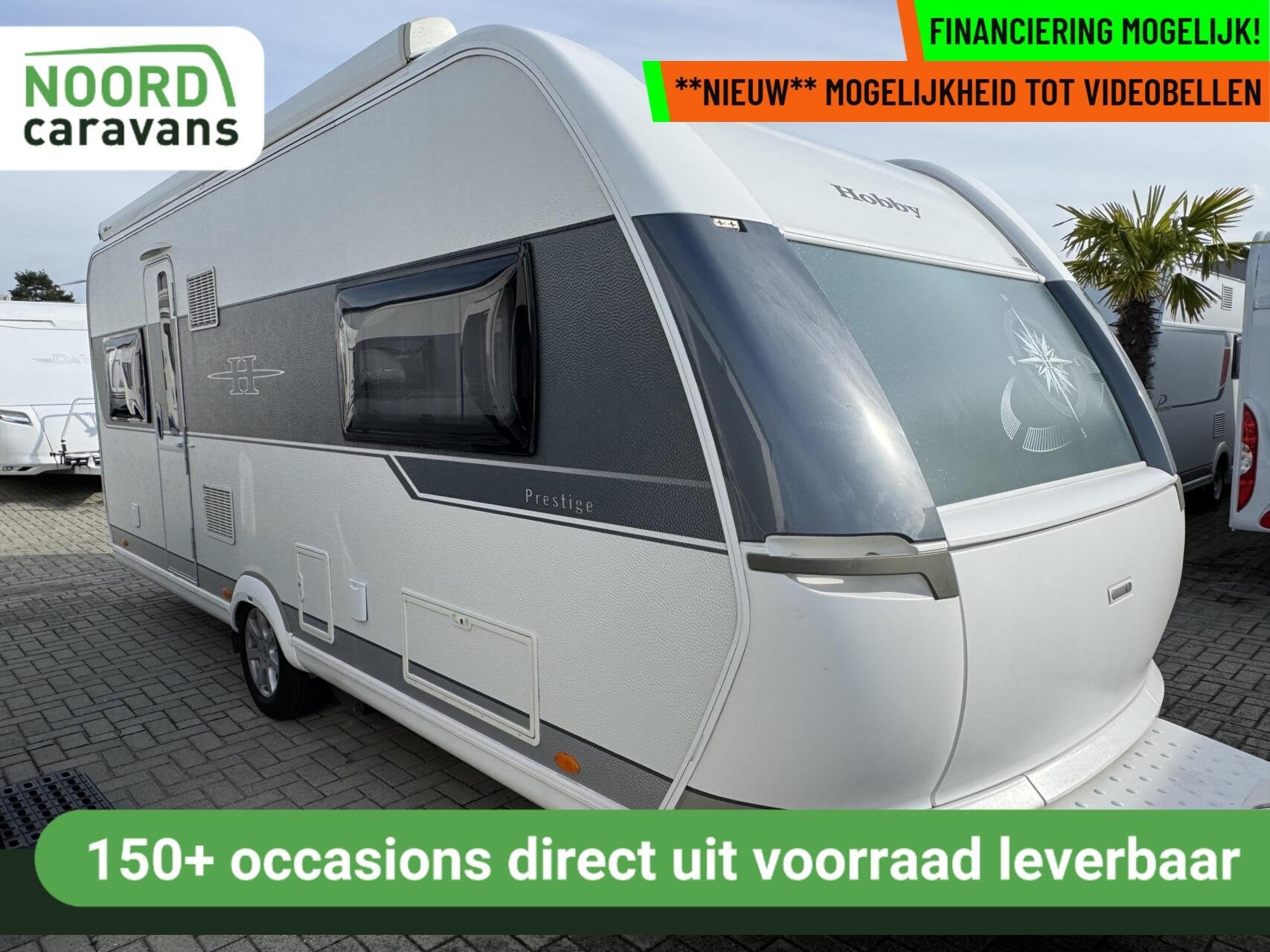 Hobby 560 UL PRESTIGE, ENKELE BEDDEN, RONDZIT, LUIFEL, MOVER, Caravans en Kamperen, Rondzit, Hobby, 7 tot 8 meter, Bedrijf