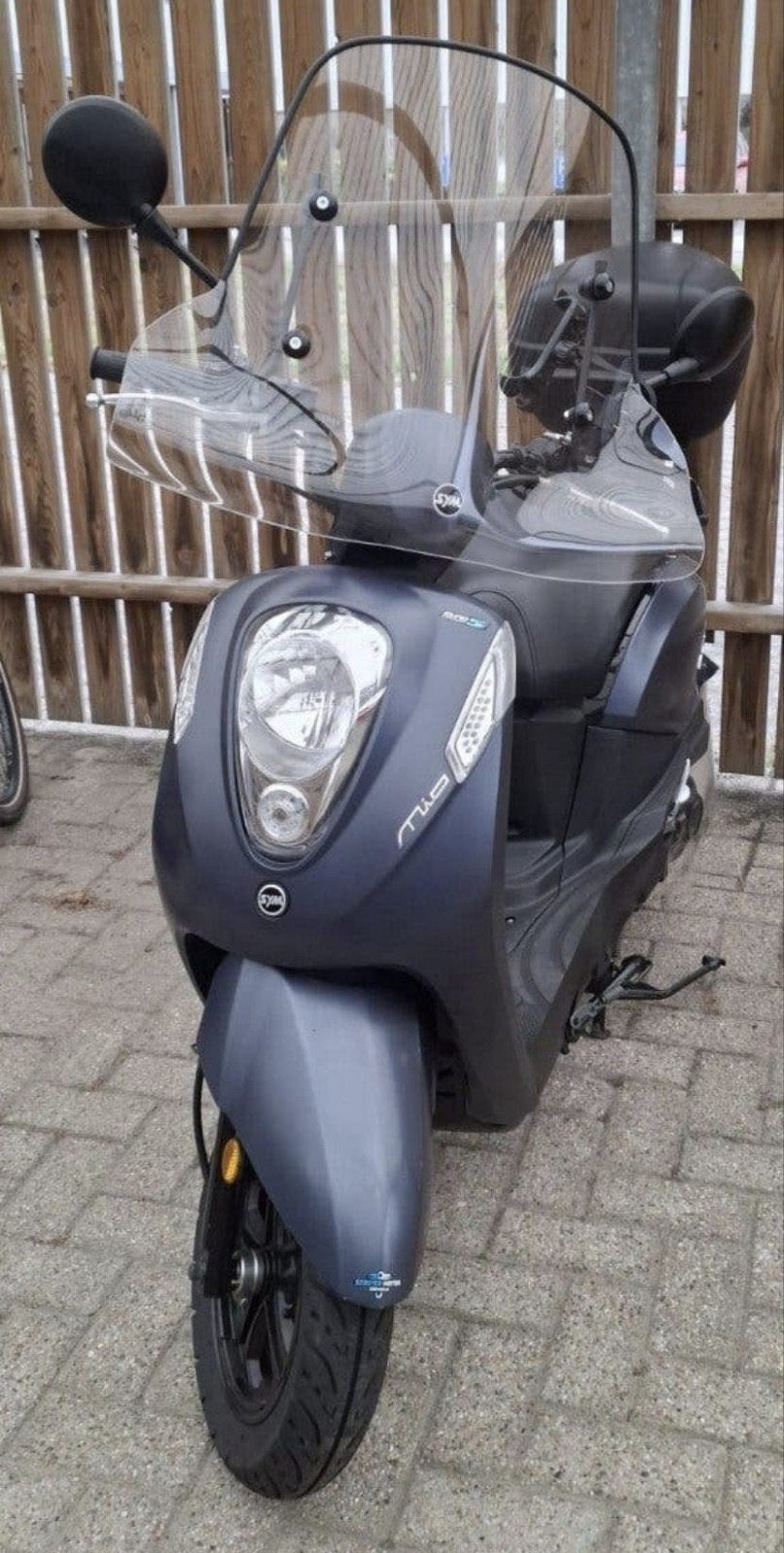 Te Koop Sym Mio i blauw kenteken, Fietsen en Brommers, Zo goed als nieuw, Benzine, Maximaal 25 km/u, Ophalen