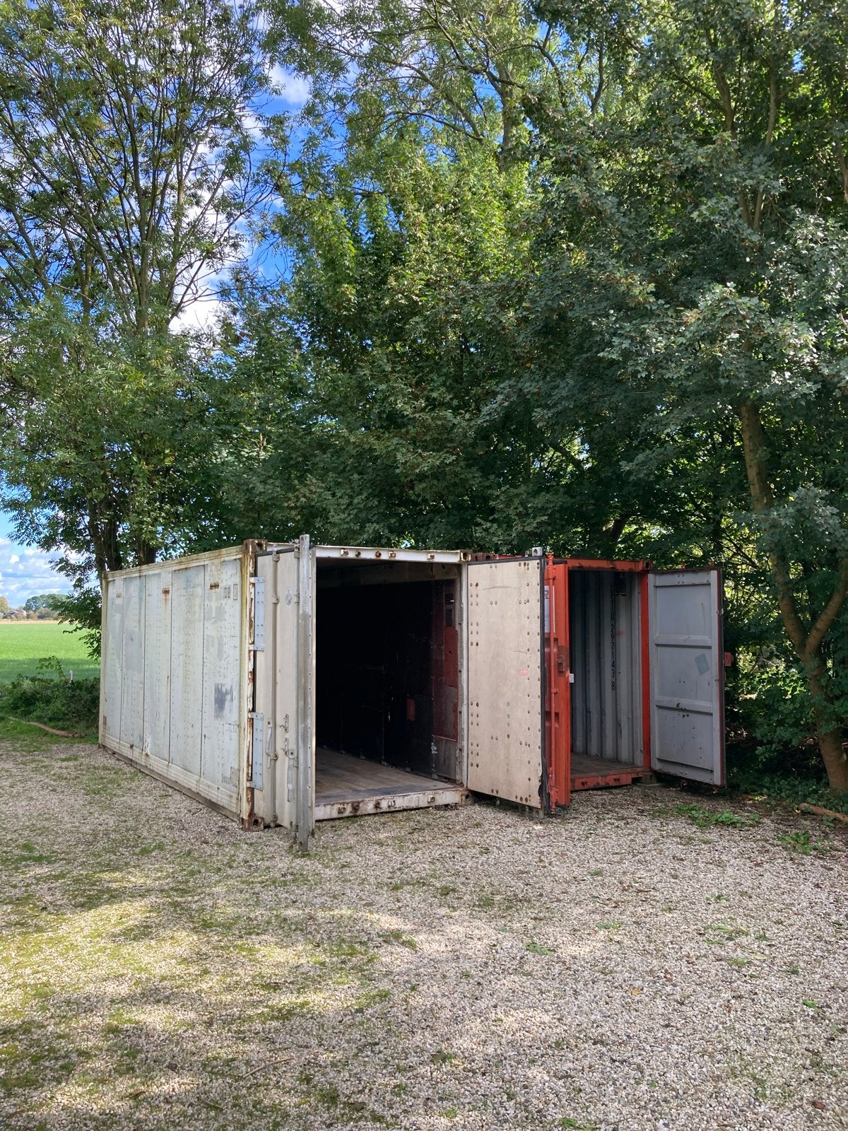 2 gebruikte opslagcontainers 20ft, Ophalen