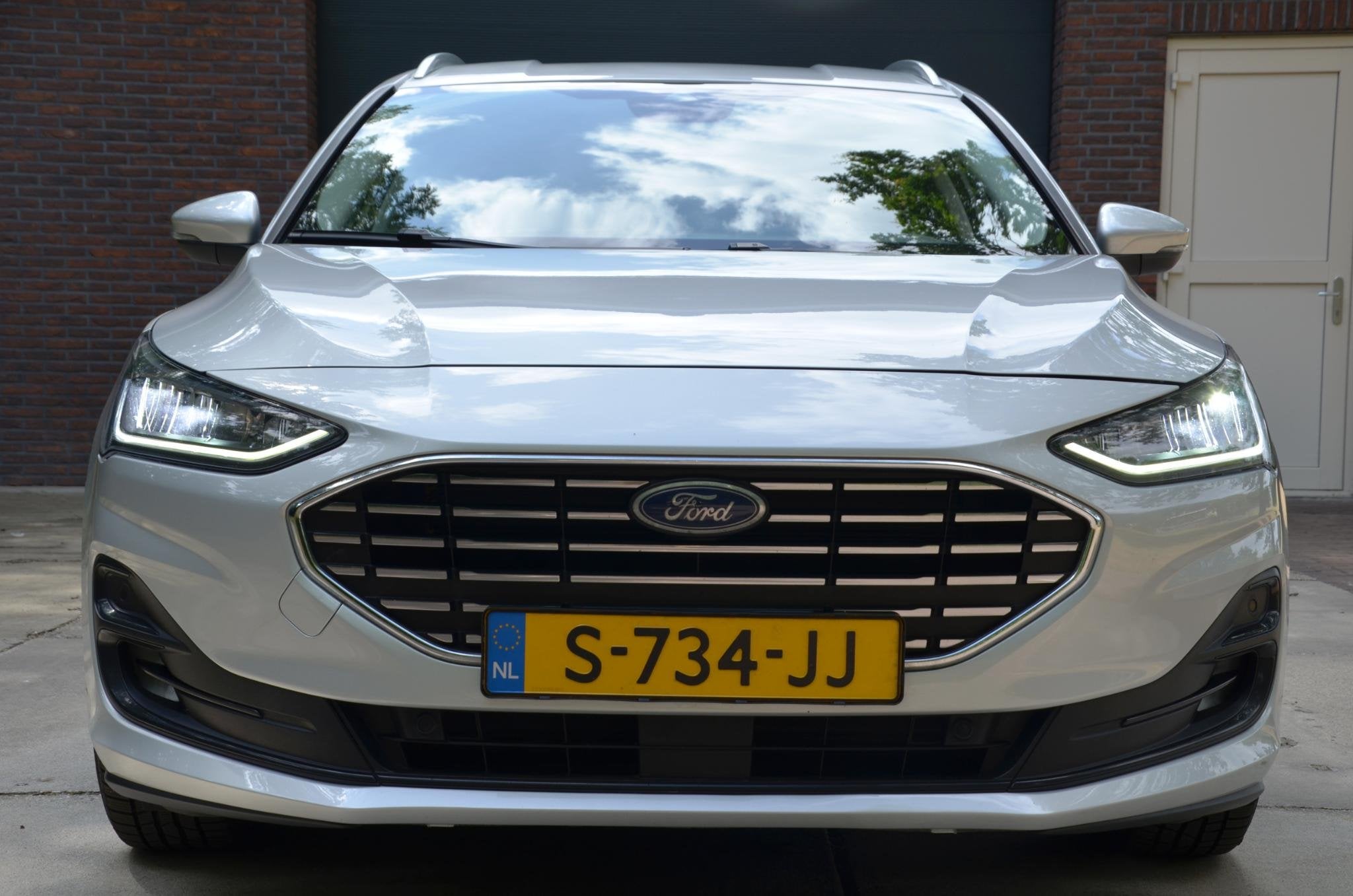 Ford Focus Wagon 1.0 EcoBoost Hybrid Titanium Navi/Pdc/Ecc/L, Gebruikt, Origineel Nederlands, Handgeschakeld, 19 km/l