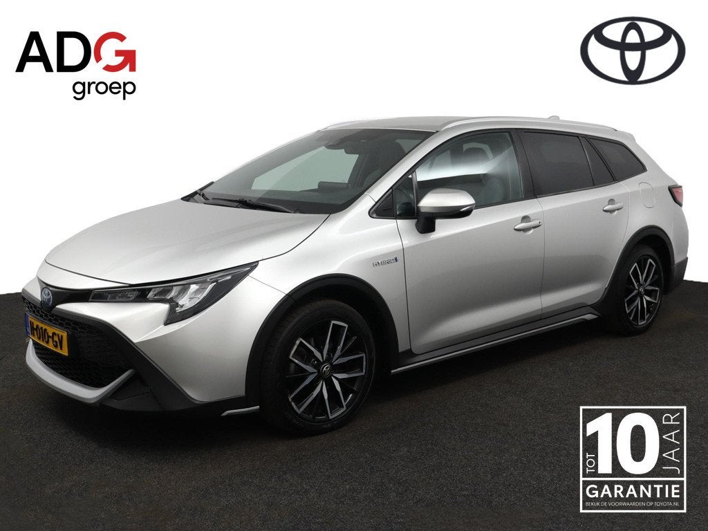 Toyota Corolla Touring Sports 1.8 Hybrid Trek | Electrische, Auto's, Toyota, 12 maanden, Gebruikt, 4 cilinders, Corolla
