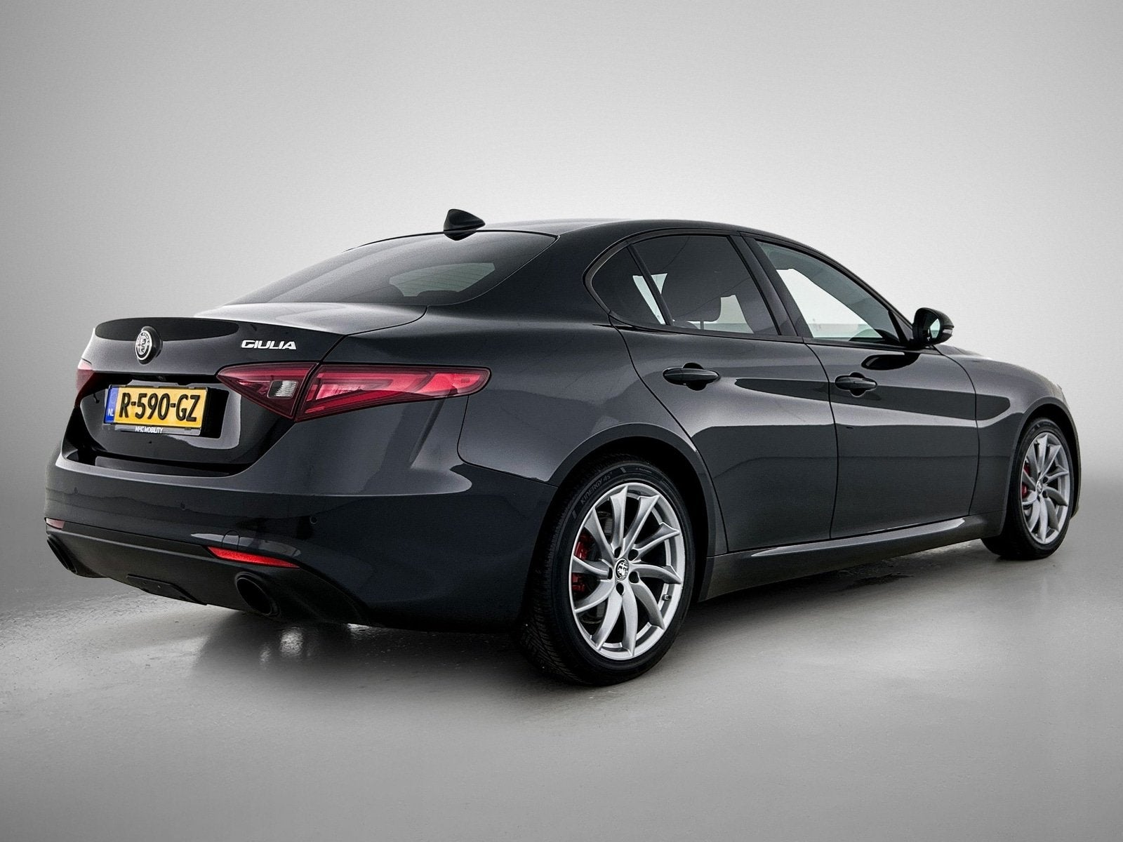 Alfa Romeo Giulia 2.0T Sprint | Trekhaak | Clima | Navi | 12, Auto's, 1404 kg, Leder en Stof, Zwart, Origineel Nederlands