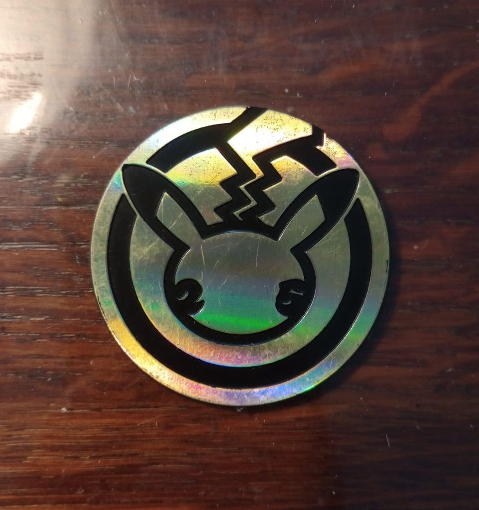 Pokémon 25th Celebrations Flip Coin – Goudkleurig (Plastic), Ophalen of Verzenden, Zo goed als nieuw, Overige typen