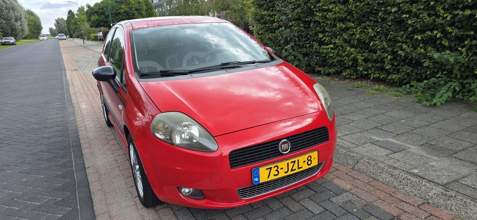 Fiat Punto 1.2 3DR 2009 Rood racing, Stof, 40 €/maand, 4 cilinders, Origineel Nederlands