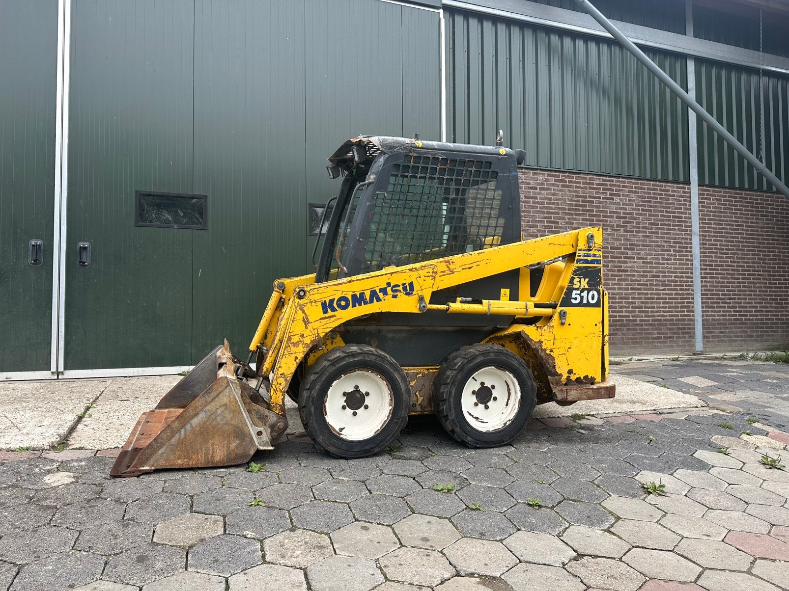 Komatsu SK 510 schranklader bj 2018 (Bobcat), Ophalen of Verzenden, Wiellader of Shovel