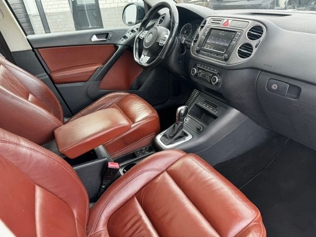 Volkswagen Tiguan 2.0 TSI 200pk Sport&Style 4Motion R-Line A, Auto's, Automaat, Euro 5, 1566 kg, Gebruikt