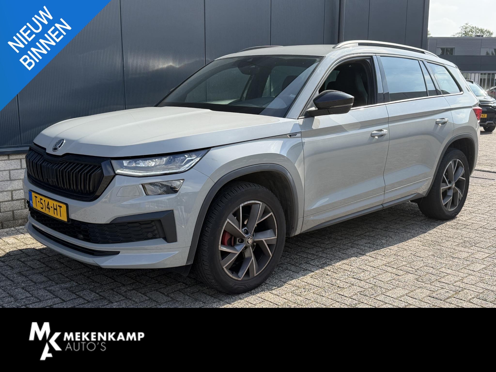 Skoda Kodiaq 1.5 TSI Sportline Business 7p. 19"/Trekhaak/Cam, Auto's, Dealer onderhouden, 4 cilinders, 150 pk, Bedrijf