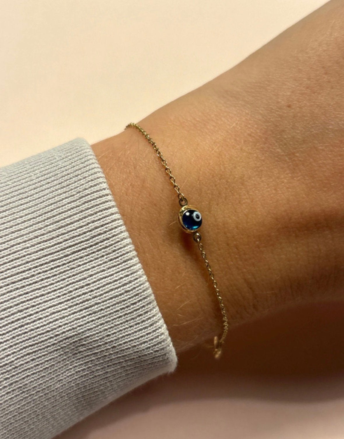 9 karaat gouden armbandje/enkelbandje infinity en boze oog, Verzenden, Zo goed als nieuw, Goud