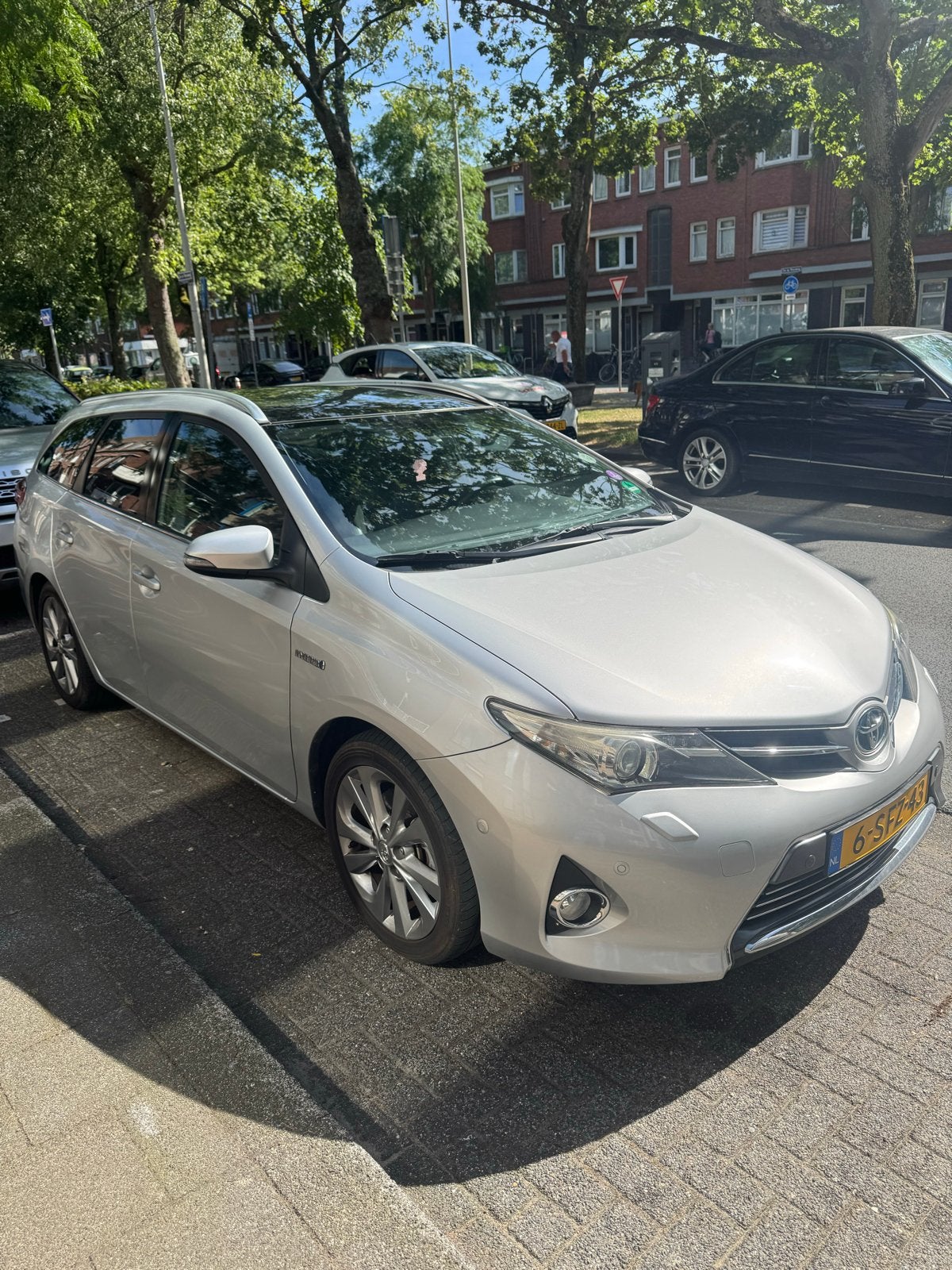 Toyota Auris 1.8 Hybrid Touring Sports inc BOVAG  2013 Grijs, Auto's, Toyota, Particulier, Auris, Hybride Elektrisch/Benzine, Volledig hybride