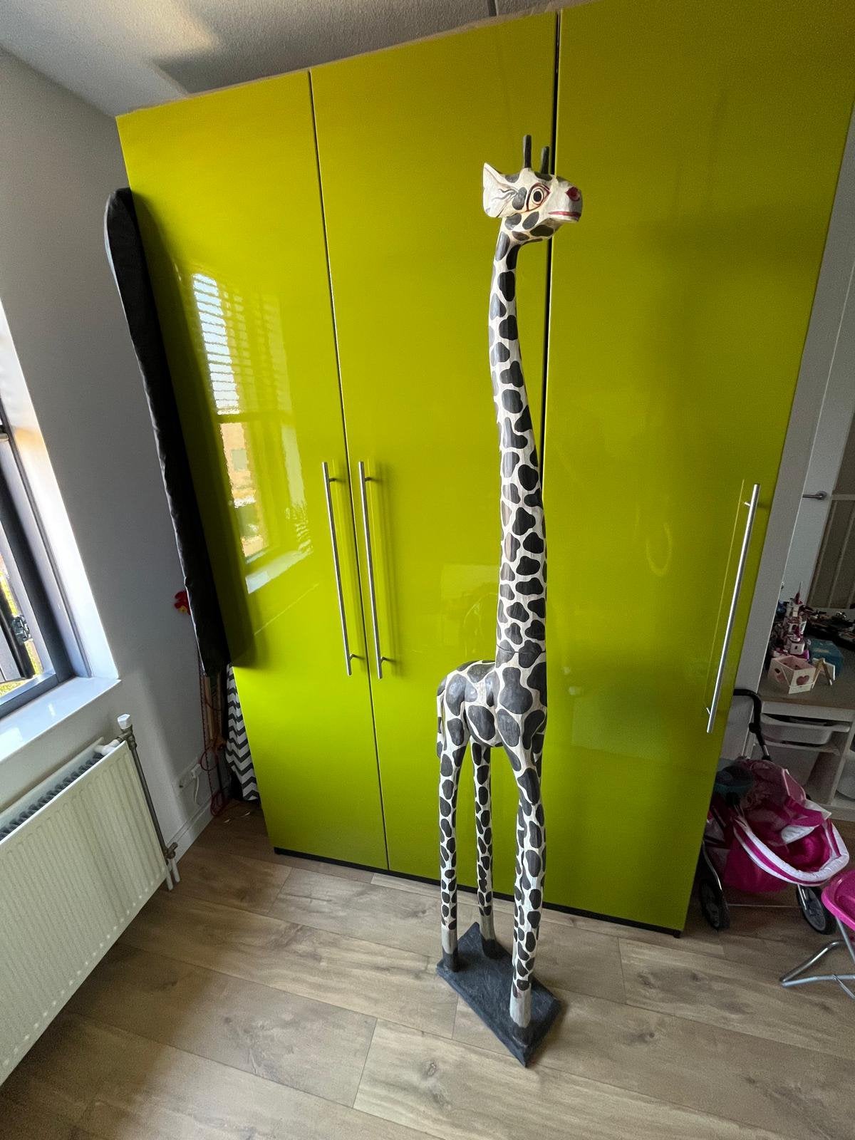 Houten giraf, Ophalen