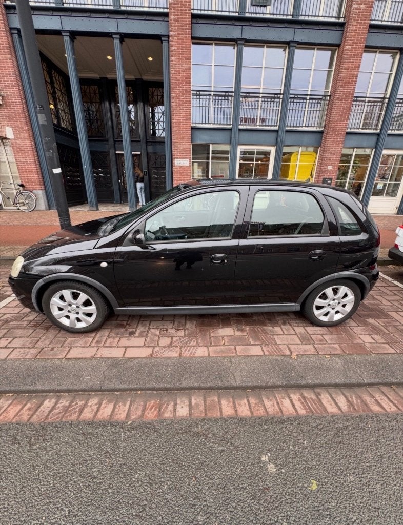Opel Corsa 1.2 16V Twinport 5D 2006 Zwart, Voorwielaandrijving, 450 kg, 31 €/maand, 4 cilinders