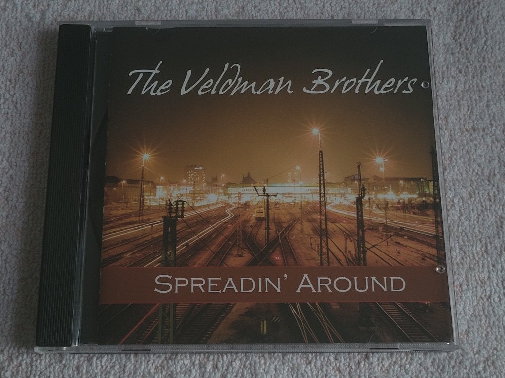 THE VELDMAN BROTHERS - Spreadin' Around CD (BLUES) ZGAN, Ophalen of Verzenden, 1980 tot heden, Zo goed als nieuw, Blues