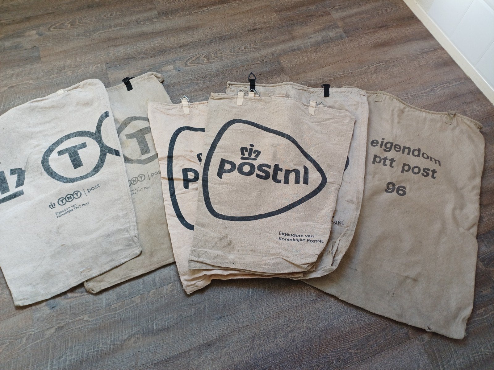 6 gebruikte postzakken van PostNL, TNT Post en PTT Post, Ophalen of Verzenden, Gebruikt