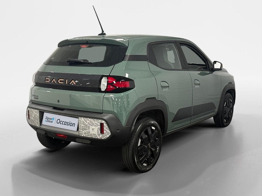Dacia Spring Extreme 65 26.8 kWh AUTOMAAT CAMERA APPLE CARPL, Auto's, Dacia, 12 maanden, Gebruikt, 4 stoelen, Leder en Stof