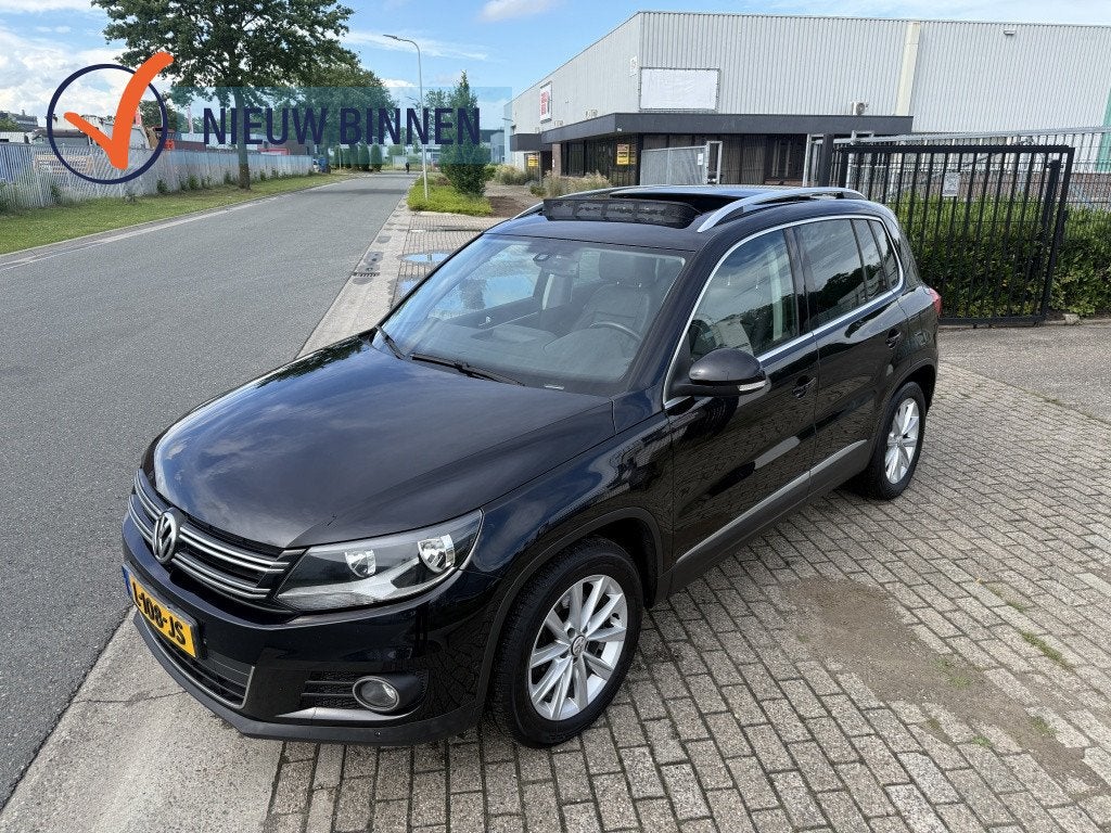 Volkswagen Tiguan 1.4 TSI Sport&Style (bj 2015), Auto's, Volkswagen, Voorwielaandrijving, Euro 5, 15 km/l, Gebruikt