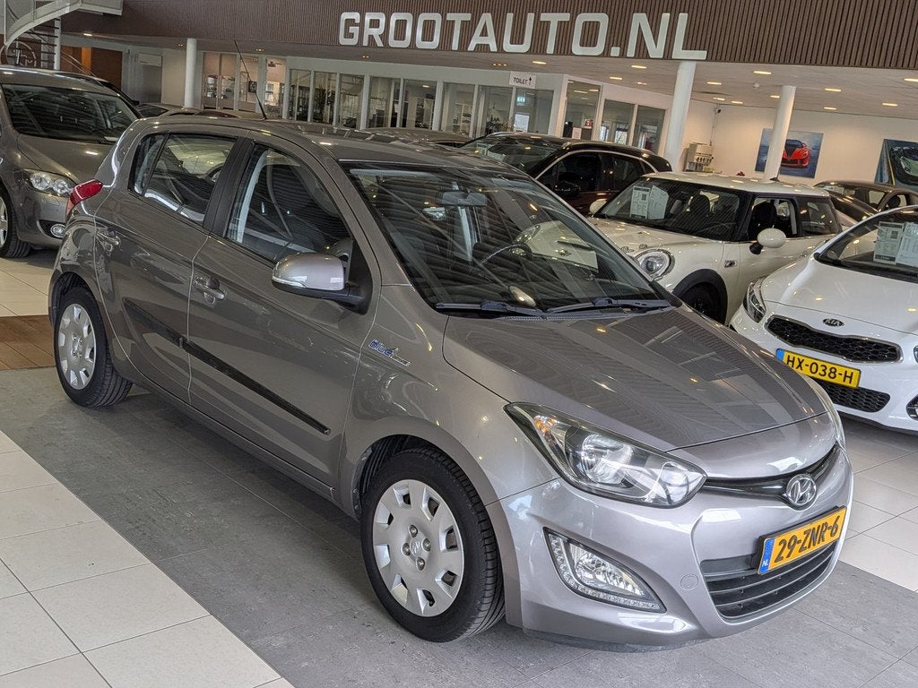 Hyundai i20 1.2i i-Motion Dealer Onderhouden, Airco, Stuurbe, Auto's, Hyundai, Euro 5, Gebruikt, 31 €/maand, 4 cilinders