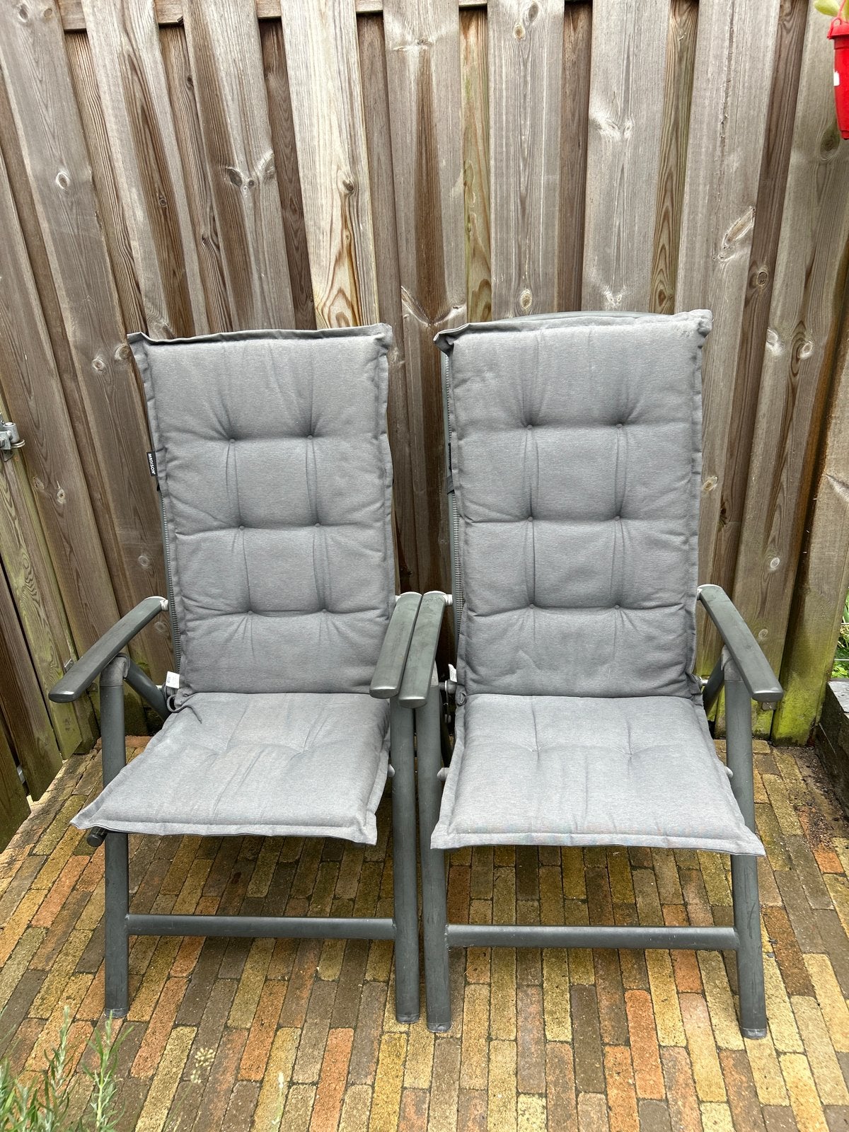 Twee Inklapbare PR design tuinstoelen grijs met kussens, Ophalen of Verzenden, Gebruikt, Kunststof, Inklapbaar