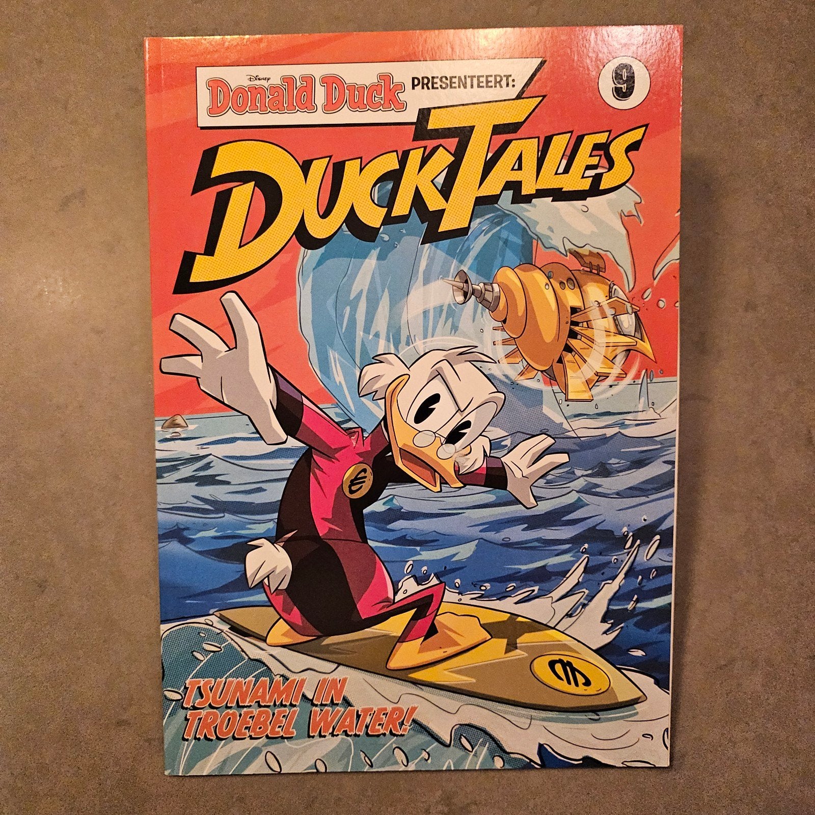 Donald Duck presenteert: DuckTales - Tsunami in troebel wate, Eén stripboek, Ophalen of Verzenden, Zo goed als nieuw, Disney